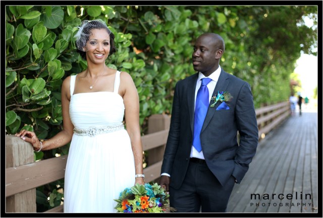 bride and groom walkway to the beach from the palms hotel